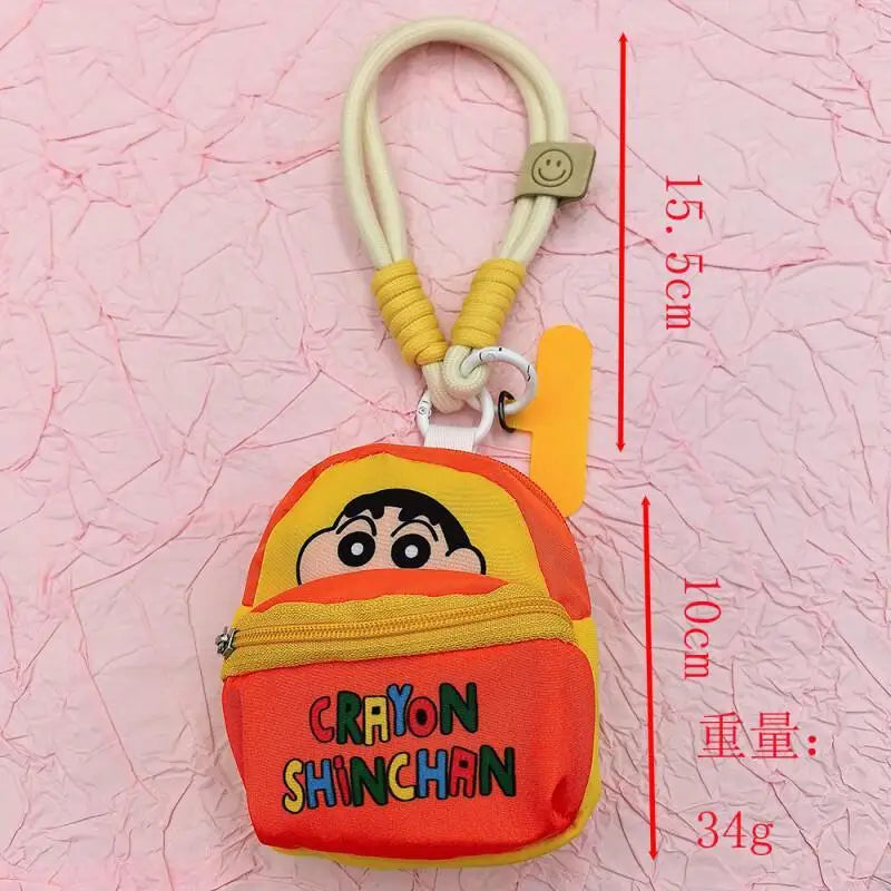 2025 Miniso New Crayon Shin chan Bag Mobile Phone Rope Multi functional Change Bluetooth Storage Bag Anti throw Wrist Strap