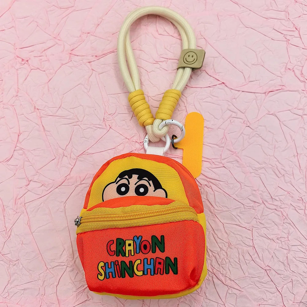 2025 Miniso New Crayon Shin chan Bag Mobile Phone Rope Multi functional Change Bluetooth Storage Bag Anti throw Wrist Strap