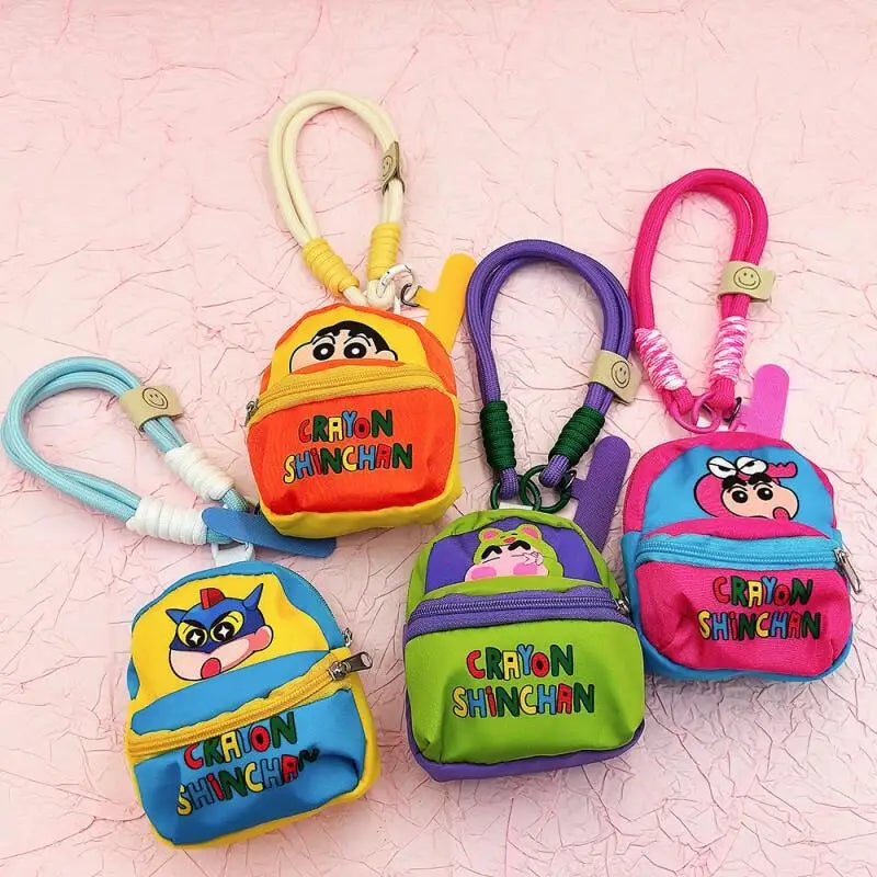 2025 Miniso New Crayon Shin chan Bag Mobile Phone Rope Multi functional Change Bluetooth Storage Bag Anti throw Wrist Strap