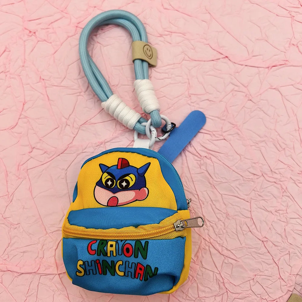 2025 Miniso New Crayon Shin chan Bag Mobile Phone Rope Multi functional Change Bluetooth Storage Bag Anti throw Wrist Strap